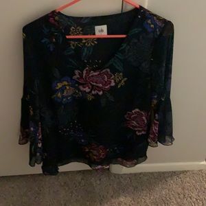 Floral blouse is small